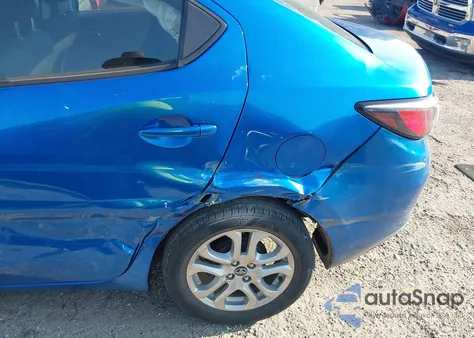 2018 Toyota Yaris Ia из США, поврежденный, VIN 3MYDLBYV2JY307716